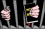 Behind jail bars with bible in hand
